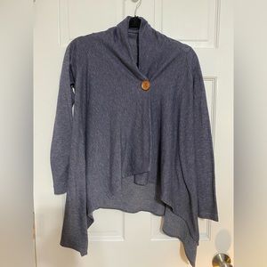 Asymmetrical cardigan with wooden button.